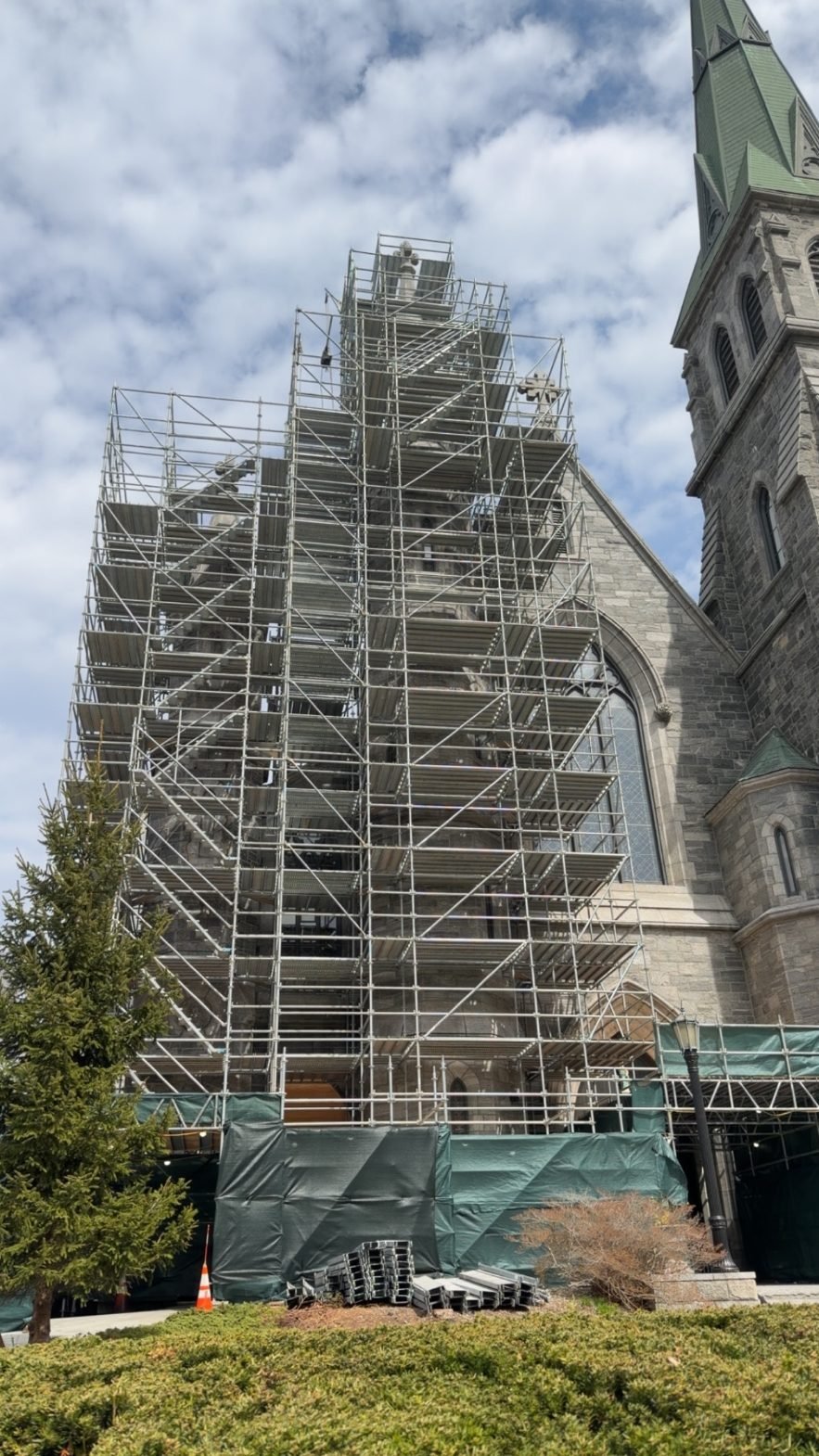 Scaffolding along a historic church wall during restoration